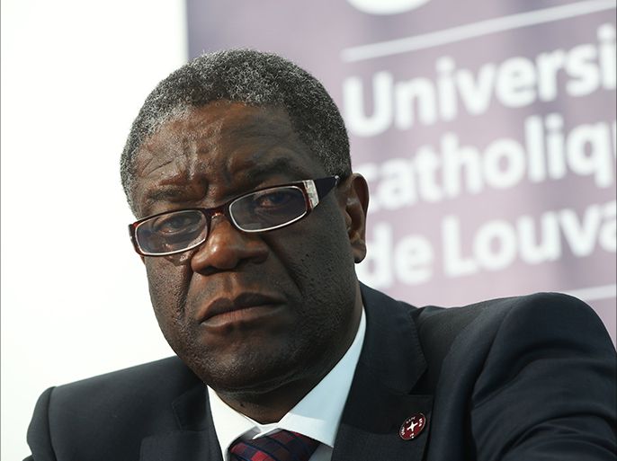 (FILES) A file picture taken on February 3, 2014 shows Democratic Republic of Congo's gynaecologist Denis Mukwege during a press conference concerning Honorary Degrees at the UCL Louvain-La-Neuve university. Mukwege won the European Parliament's prestigious Sakharov human rights prize on October 21, 2014 for his work in helping thousands of gang rape victims in the Democratic Republic of Congo.