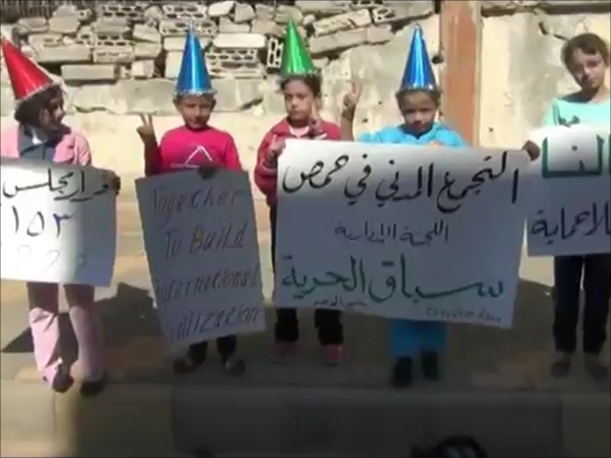 ‪أطفال سوريا يتحدون واقع الدمار بإعلانهم حبهم للحياة‬ (الجزيرة)