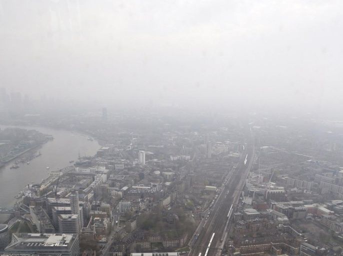 A view of London's skyline, Thursday, April 3, 2014. British authorities have warned people with heart or lung conditions to avoid exertion as a combination of industrial pollution and Sahara dust blankets the country in smog. The environment department said air pollution level could reach the top rung on its 10-point scale. The pollution is expected to ease by Friday. (AP Photo/Lefteris Pitarakis)