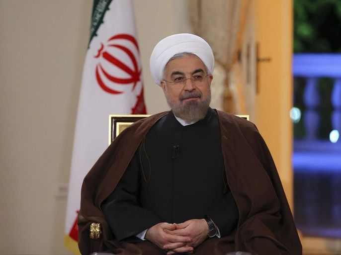 In this photo released by the Iranian Presidency Office, President Hassan Rouhani attends an interview with the state-run TV in Tehran, Iran, on Monday, Oct. 13, 2014. Iran's president said on Monday that Tehran and world powers may still be able to reach a final deal on the country's controversial nuclear program before the Nov. 24 deadline. The remarks by moderate President Hassan Rouhani came as Iran and the six nation group — the five permanent members of the U.N. Security Council plus Germany — are to begin another round of talks in Vienna on Tuesday, in the countdown to the November deadline for a final, comprehensive deal. (AP Photo/Iranian Presidency Office, Mohammad Berno)