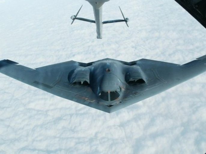 The B-2 Spirit stealth bomber approaches an U.S. Air Force KC-10(A) tanker plane over the Missouri sky to receive an aerial refueling after taking off from the Whiteman Air Force Base in Johnson County, Missouri in this October 30, 2002 file photo. A U.S. B-2 stealth bomber crashed at Andersen Air Force Base in Guam just after taking off but the two pilots on board ejected safely, the U.S. Air Force said late February 22, 2008.
