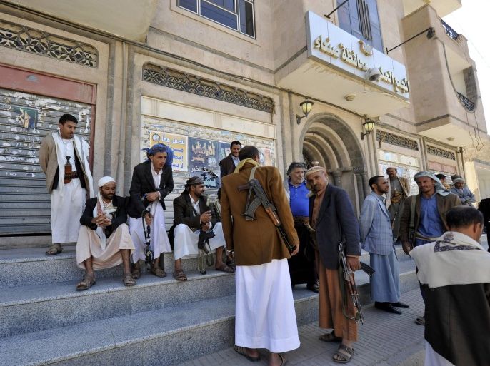 SANA'A, YEMEN - OCTOBER 19: Members of Shia Houthi Ansarullah movement stand guard after capturing governor's building in Sana'a, Yemen, on October 19, 2014.