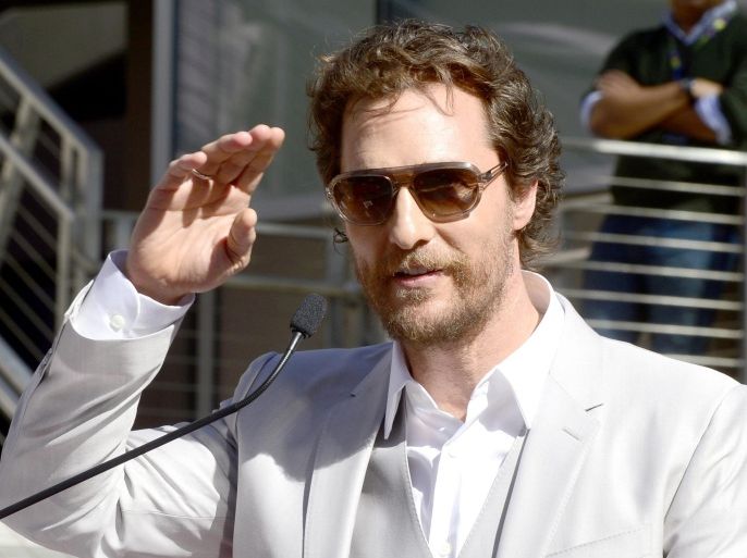 US Actor Matthew McConaughey salutes fans during a ceremony honoring him with a star on the Hollywood Walk of Fame in Hollywood, California, USA, 17 November 2014. McConaughey who stars in the newly released movie Interstellar received the 2,534th star in the motion picture category.
