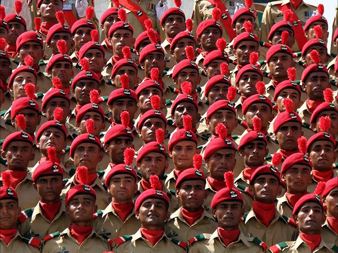 epa04418205 Pakistani Army recruits pose for a photograph during a passing out ceremony in Hyderabad, Pakistan, 26 September 2014. More than 500 of the Pakistani Army's Sindh regiment recruits attended the passing out ceremony.