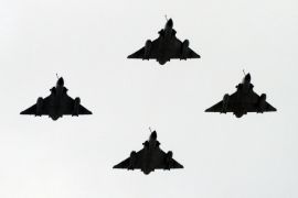 PARIS, FRANCE - JULY 14: Four Mirage 2000 fly over Paris during the annual Bastille Day military parade on July 14, 2014 in Paris, France. France has issued an unprecedented invitation to all 72 countries involved in World War I to take part in its annual Bastille Day military parade.