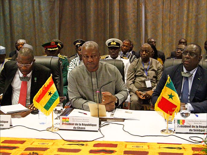 epa04477846 President of Ghana John Mahama Dramani (C) President of Senegal Macky Sall (R) and President of Nigeria Goodluck Jonathan (L) attend a meeting of ECOWAS leaders and the transitional leader of Burkina Faso Lieutenat-Colonel Isaac Zida (not pictured) in Ouagadougou, Burkina Faso 05 November 2014. The presidents of Ghana, Nigeria and Senegal visited Ouagadougou to meet with the military to negotiate for the return to civilian rule. President Blaise Compaore on 31 October 2014 resigned following the violent protests against his bid to change the constitution to extend his rule of 27 years. Presidential guard commander Lieutenat-Colonel Isaac Zida assumed the role of transitional leader but the African Union (AU) has issued the military a two-week time frame to hand power to a civilian ruler or face sanctions. EPA