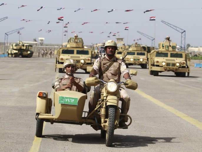 المراقبون يرجعون تقدم تنظيم الدولة ميدانياإلى استشراء الفساد بالجيش العراقي(رويترز)
