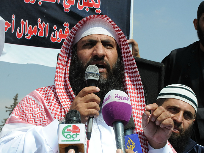 ‪أبو سياف: تنظيم الدولة سيطلب الإفراج عن أسرى مقابل الطيار‬ (الجزيرة نت-أرشيف)