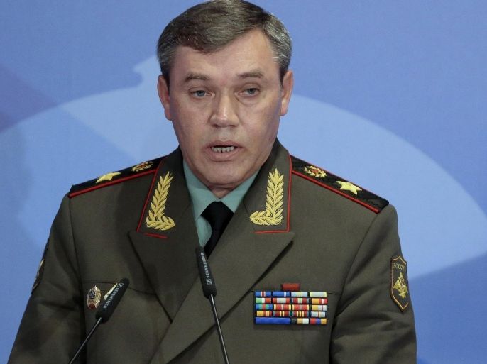 In this Thursday, May 23, 2013 file photo Gen. Valery Gerasimov, the chief of the Russian military's General Staff, speaks during a security conference in Moscow, Russia. The European Union on Tuesday released the names of 15 new targets of sanctions because of their roles in the Ukraine crisis. The list includes Gerasimov and first deputy defense minister, and Lt. Gen. Igor Sergun, identified as head of GRU, the Russian military intelligence agency. (AP Photo/Mikhail Metzel, file)