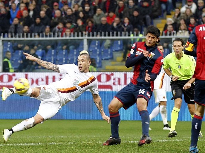 GENOA, ITALY - DECEMBER 14: Radja Nainggolan of AS Roma scores the opening goal during the Serie A match between Genoa CFC and AS Roma at Stadio Luigi Ferraris on December 14, 2014 in Genoa, Italy.