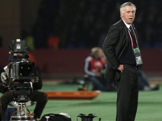 Real Madrid’s Coach Carlo Ancelotti watches during the semi final soccer match between Real Madrid and Cruz Azul at the Club World Cup soccer tournament in Marrakech, Morocco, Tuesday, Dec. 16, 2014. (AP Photo/Christophe Ena)