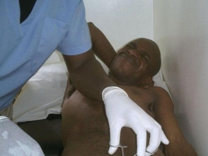 In this image provided by the British Broadcasting Corp., Kennedy Gondwe a southern African radio correspondent is circumcised at a health center in Zambia's capital Lusaka on Thursday, Nov. 22, 2007. Gondwe has been receiving a flood of text messages and cell phone calls - some from offended listeners and readers. The response isn't to a story on politics, corruption or soccer - all topics likely to elicit passionate responses. Rather, Zambia-based Kennedy Gondwe said in an interview Friday, he is attracting attention because he chose to get circumcised as a way of protecting himself from AIDS, and took the British Broadcasting Corp.'s radio and Web audience through the procedure with him.