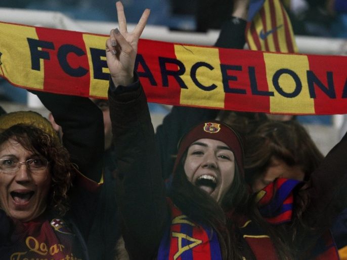 Barcelona fans pose for a photo ahead of a Champions League Group F soccer match between APOEL and FC Barcelona at GSP stadium, in Nicosia, Cyprus, Tuesday, Nov. 25, 2014. (AP Photo/Petros Karadjias)