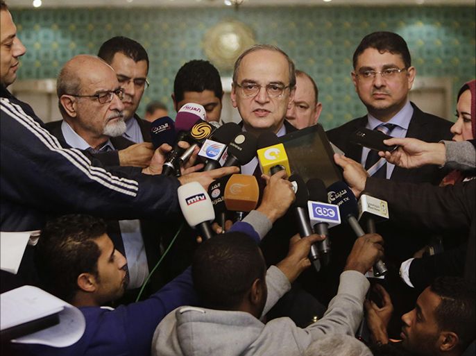 Hadi Bahra, the head of the Syrian National Coalition, the country's main political opposition group, speaks during a press conference following his meeting with the Arab League's Secretary-General Nabil Elaraby at the league's headquarters in Cairo, Egypt, Saturday, Dec. 27, 2014. (AP Photo/Amr Nabil)