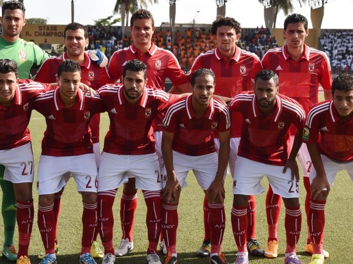 Egyptian' Al Haly players pose on November 29, 2014 at Robert Champroux stadium in Abidjan during their Confederation Cup (CAF) first leg final match between Egyptian Al Ahly and Ivory Coast's Sewe Sport de San Pedro. Sewe Sport won 2-1. AFP PHOTO / ISSOUF SANOGO