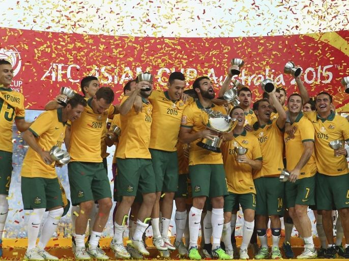 SYDNEY, AUSTRALIA - JANUARY 31: Australia celebrate with the trophy during the 2015 Asian Cup final match between Korea Republic and the Australian Socceroos at ANZ Stadium on January 31, 2015 in Sydney, Australia.