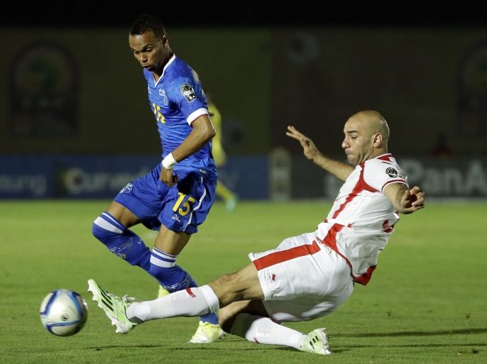 Cape Verde's Nuno Rocha, left, is challenged by Tunisia's Aymen Abdennour, right, during the African Cup of Nations Group B soccer match between Cape Verde and Tunisia in Ebebiyin, Equatorial Guinea, Sunday, Jan. 18, 2015. (AP Photo/Themba Hadebe)