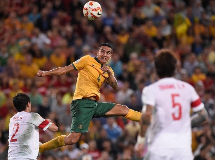 BRISBANE, AUSTRALIA - JANUARY 22: Tim Cahill of Australia heads the ball into the goal during the 2015 Asian Cup match between China PR and the Australian Socceroos at Suncorp Stadium on January 22, 2015 in Brisbane, Australia.