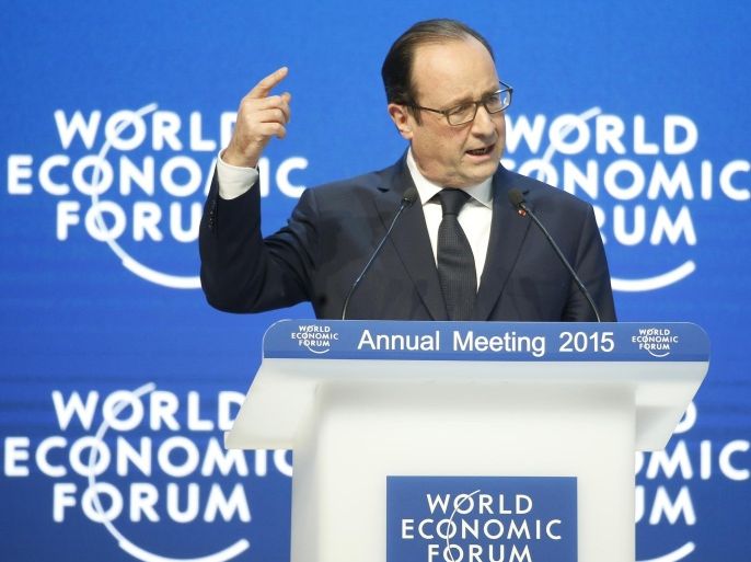 Francois Hollande, France's president, gestures as he speaks during a session on day three of the World Economic Forum (WEF) in Davos, Switzerland, on Friday, Jan. 23, 2015. World leaders, influential executives, bankers and policy makers attend the 45th annual meeting of the World Economic Forum in Davos from Jan. 21-24.