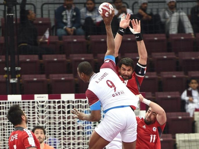 Qatar's Rafael Capote shoots the ball during the 24th Men's Handball World Championships preliminary round Group A match between Qatar and Chile at the Lusail Sports Arena in Lusail in Doha on January 17, 2015. AFP PHOTO / FAYEZ NURELDINE