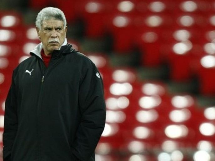 Egypt's soccer team coach Hassan Shehata watches his team during a training session at Wembley stadium in London, Tuesday, March 2, 2010. Egypt play a friendly international match against England on Wednesday, March 3.