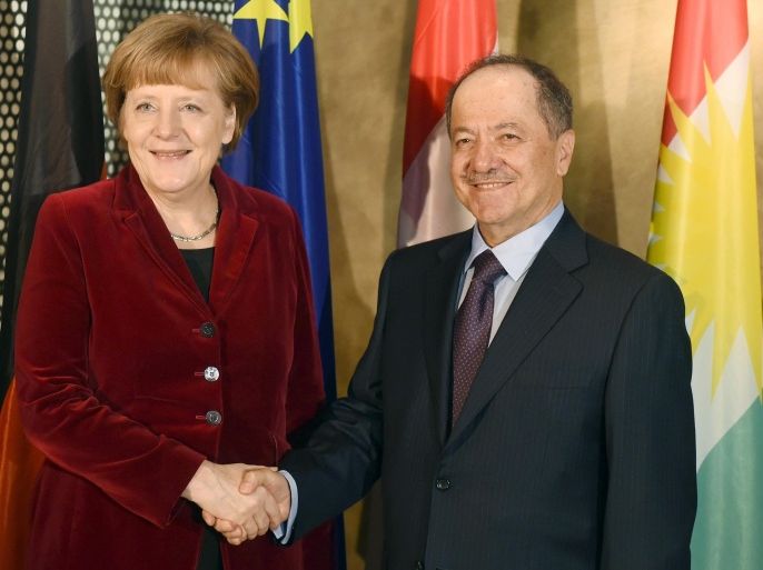 German chancellor Angela Merkel , left, shakes hands with the President of the Kurdistan Regional Government Masud Barzani at the Security Conference in Munich, Germany, Saturday, Feb. 7, 2015. (AP PhotoTobias Hase,Pool)