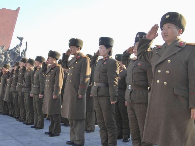 North Koreans pay their respects at the statues of former North Korean leaders Kim Il Sung and Kim Jong Il (unseen) on Lunar New Year in this February 19, 2015 photo released by North Korea's Korean Central News Agency (KCNA) in Pyongyang February 19, 2015. REUTERS/KCNA (NORTH KOREA - Tags: POLITICS) ATTENTION EDITORS - THIS PICTURE WAS PROVIDED BY A THIRD PARTY. REUTERS IS UNABLE TO INDEPENDENTLY VERIFY THE AUTHENTICITY, CONTENT, LOCATION OR DATE OF THIS IMAGE. FOR EDITORIAL USE ONLY. NOT FOR SALE FOR MARKETING OR ADVERTISING CAMPAIGNS. THIS PICTURE IS DISTRIBUTED EXACTLY AS RECEIVED BY REUTERS, AS A SERVICE TO CLIENTS. NO THIRD PARTY SALES. NOT FOR USE BY REUTERS THIRD PARTY DISTRIBUTORS. SOUTH KOREA OUT. NO COMMERCIAL OR EDITORIAL SALES IN SOUTH KOREA