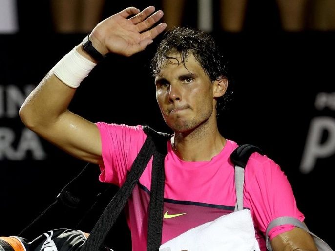 RIO DE JANEIRO, BRAZIL - FEBRUARY 21: Rafael Nadal of Spain leaves the court after losing to Fabio Fognini of Italy during the Rio Open at the Jockey Club Brasileiro on February 21, 2015 in Rio de Janeiro, Brazil.
