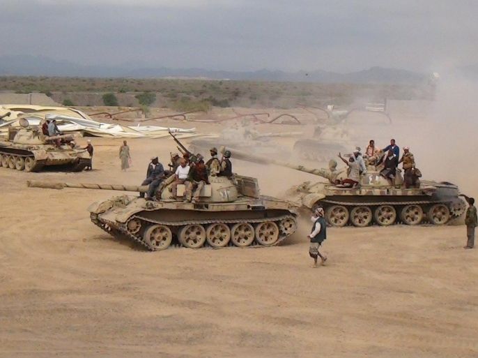 Southern People's Resistance militants loyal to Yemen's President Abd-Rabbu Mansour Hadi move tanks from the al-Anad air base in the country's southern province of Lahej March 24, 2015. Fighters from Yemen's dominant Houthi movement drew closer to President Abd-Rabbu Mansour Hadi's refuge in Aden on Tuesday, taking over two towns north of the port city as columns advanced from different directions. REUTERS/Stringer