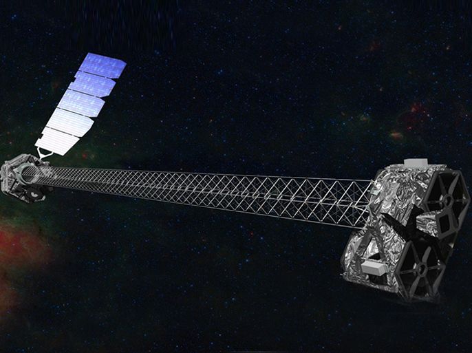 epa04089440 A handout image provided by the National Aeronautics and Space Administration (NASA) on 13 February 2014 shows an artist's concept of 'NuSTAR' on orbit. 'NuSTAR', or Nuclear Spectroscopic Telescope Array, has a 1