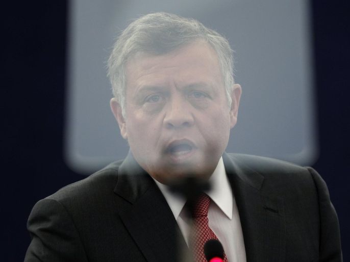 Jordan's King Abdullah is seen through the screen of a video prompter as he addresses the European Parliament during a debate in Strasbourg, March 10, 2015. REUTERS/Vincent Kessler (FRANCE - Tags: POLITICS ROYALS)