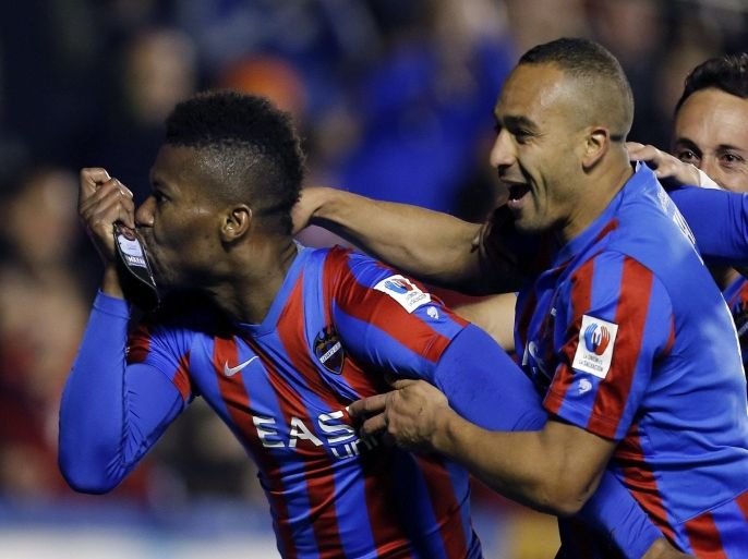 UD Levante´s Nigerian Kalu Uche (L) celebrates after scoring the second goal against Eibar during their Primera Division soccer match played at Ciutat Valencia stadium in Valencia, eastern Spain, on 06 March 2015. Levante won 2-1.