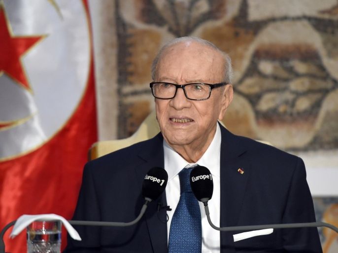 Tunisian President Beji Caid Essebsi speaks during a press conference on March 22, 2015 following his visit at the National Bardo Museum in Tunis to pay tribute to the victims of the deadly attack claimed by the Islamic State (IS) jihadist group. Essebsi said security 'failures' had helped facilitate the attack that killed 20 foreign tourists and a Tunisian policeman. AFP PHOTO / FETHI BELAID