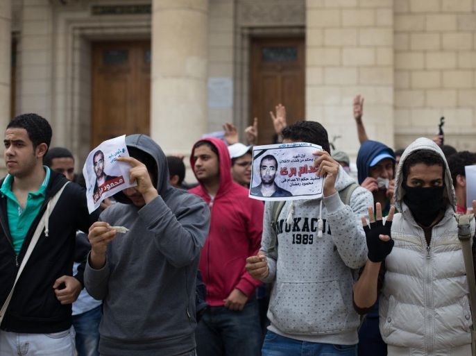 GIZA, EGYPT - MARCH 10: A group of student stage a protest for their executed anti-coup friend Mahmoud Ramazan, in Cairo University, Giza , on March 10, 2015.