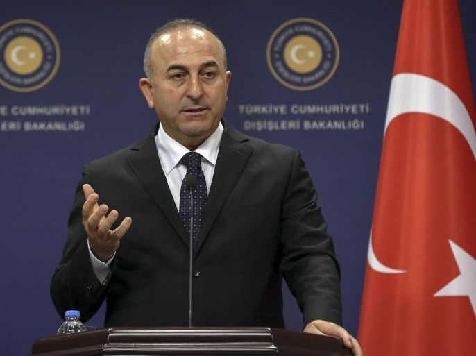 ANKARA, TURKEY - MARCH 13: Turkish Foreign Minister Mevlut Cavusoglu holds a press conference with his Macedonian counterpart Nikola Poposki (not seen) after a meeting at the Turkey's Foreign Ministry building in Ankara, Turkey on March 13, 2015.