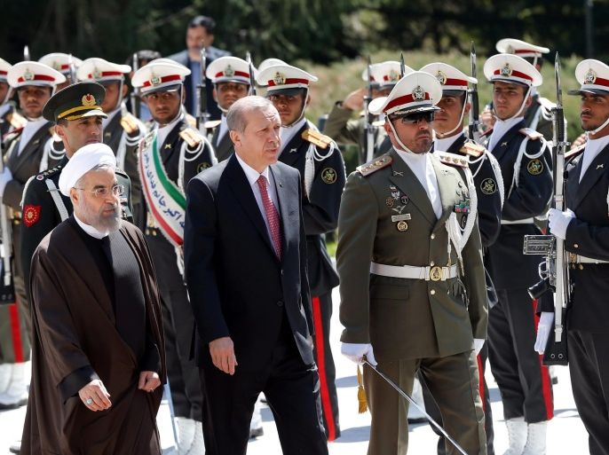Iranian President Hassan Rowhani (L) welcomes his Turkish counterpart Recep Tayyip Erdogan (2-L) in Tehran, Iran, 07 April 2015. Erdogan is in Tehran for a one-day official visit, amid tensions over the crisis in Yemen.