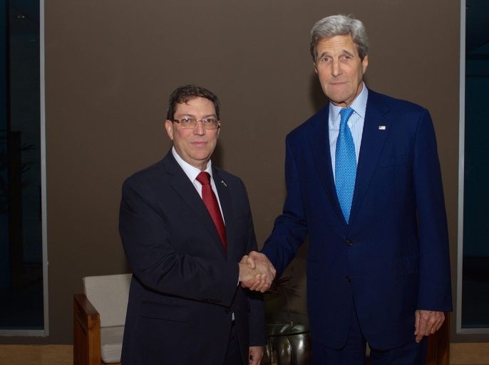 A handout picture made available by the US Department of State shows US Secretary of State John Kerry (R) shaking hands with Cuban Foreign Minister Bruno Rodriguez (L) in Panama City, Panama, 09 April 2015, as they hold a bilateral meeting - the first between officials at their level since 1958 - on the sidelines of the Summit of the Americas (SOA). The SOA runs from 10 to 11 April. EPA/GLEN JOHNSON/US DEPARMENT OF STATE