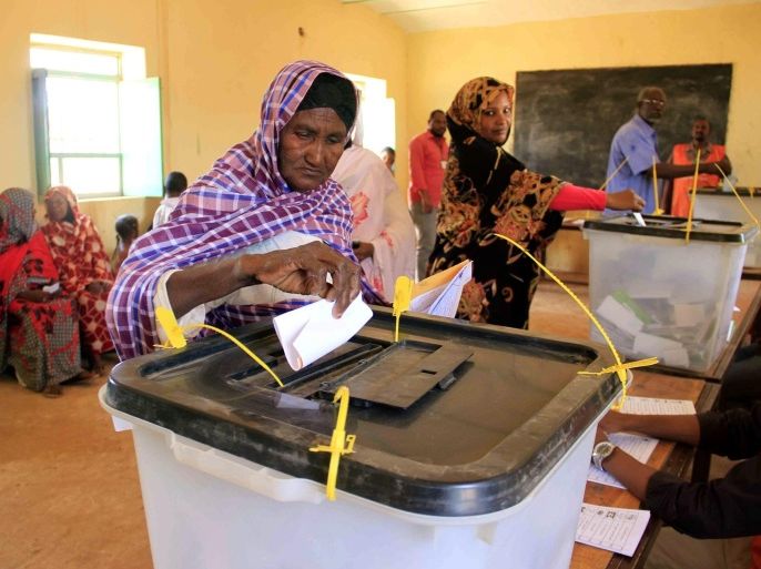 Sudanese voters cast their ballot papers on the second day of the country's Presidential and National Assembly elections, at polling station in Khartoum, Sudan, 14 April 2015. Sudan's polling stations opened for the second day on 14 April, but voter turnout remained low in general elections expected to extend the 25-year rule of President Omar al-Bashir. Sudan's main opposition parties are boycotting the April 13-15 election, which means al-Bashir is facing 15 candidates who are running on independent platforms or whose parties are little known in the country of 38 million people.