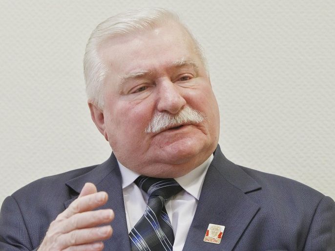 Poland’s former president and Solidarity leader Lech Walesa talks with The Associated Press in Warsaw, Poland, Thursday, Feb. 19, 2015 about the need for global solidarity in using economic sanctions against Russian President Vladimir Putin as a means of obtaining a change in his aggressive policy. (AP Photo/Czarek Sokolowski)