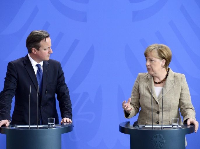 German Chancellor Angela Merkel (R) and British Prime Minister David Cameron give a joint statement after a meeting on May 29, 2015, at the Chancellery in Berlin, Germany. Cameron is on a two-day tour of European capitals in a bid to secure EU reforms as his government published a law paving the way for a vote on whether Britain should leave. AFP PHOTO / JOHN MACDOUGALL