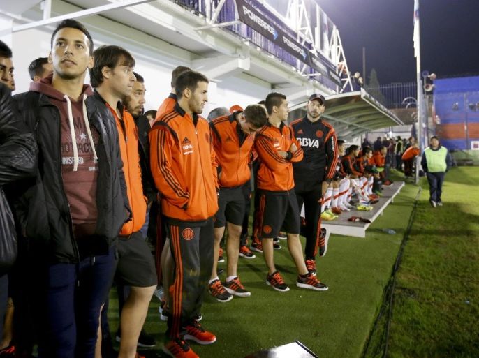VICTORIA, ARGENTINA - MAY 24: Players of River Plate watch a second division match waiting for the confirmation of the Tigre v River Plate match suspension after the death of Cristian Gómez a player of second division football club Atletico Parana at Presidente Peron Stadium on May 24, 2015 in Victoria, Argentina.