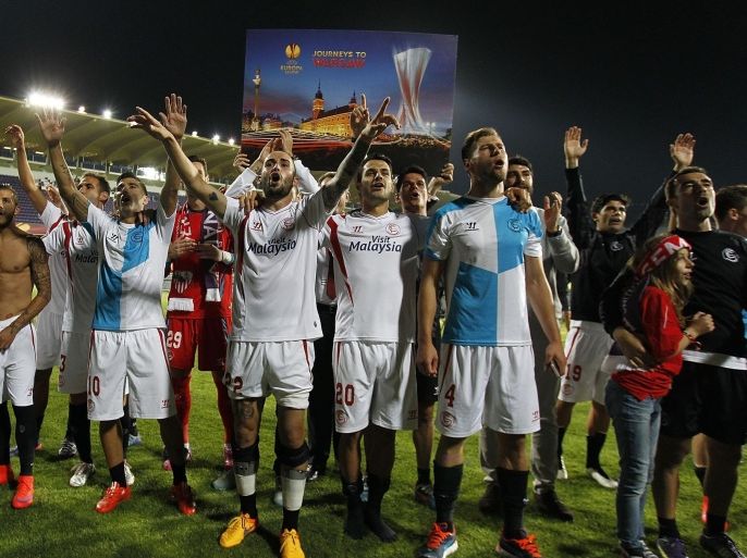 FLORENCE, ITALY - MAY 14: Players of FC Sevilla celebrate the victory after the UEFA Europa League Semi Final match between ACF Fiorentina and FC Sevilla on May 14, 2015 in Florence, Italy.