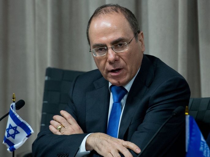 file picture taken on December 9, 2013 shows then Israeli Regional Development Minister Silvan Shalom speaking after Israel signed an agreement with Jordan and the Palestinians at the World Bank in Washington DC, to construct a Red Sea-Dead Sea pipeline to carry water north and slow down the desiccation of the Dead Sea. Israeli Prime Minister Benjamin Netanyahu appointed his new vice president and interior minister Shalom to lead future negotiations with the Palestinians, an official said on May 18, 2015. AFP PHOTO/ NICHOLAS KAMM