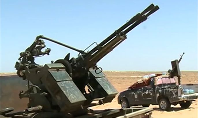 قوات فجر ليبيا تواصل حصار قاعدة الوطية الجوية