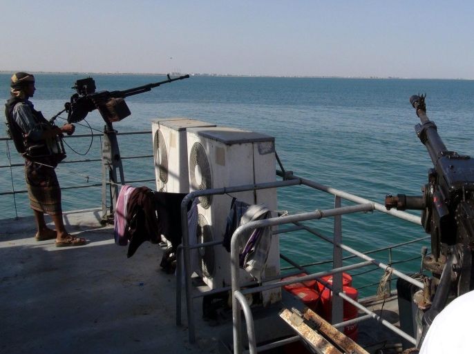 Fighters loyal to Yemeni President Abdo Rabbo Mansour Hadi stand behind a machine gun on a ship of the Yemeni navy forces off Yemen's southern coasts in the Gulf of Aden, Yemen, 17 April 2015. The Saudi-led coalition targeting the Iran-backed Houthi rebels in Yemen has fulfilled most of its military objectives, succeeding in forcing out Houthi militiamen from most parts of Aden city.