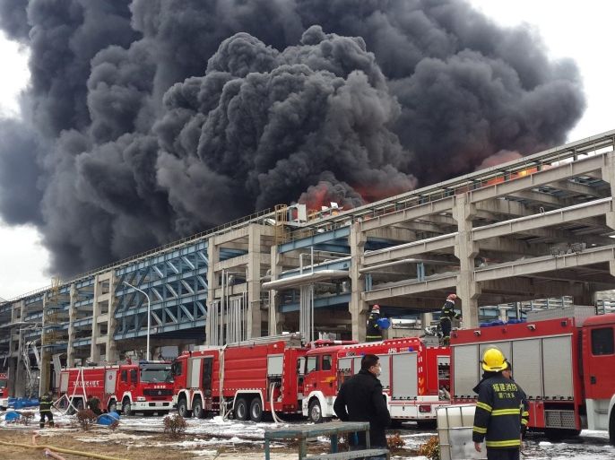 Firefighters battle a blaze following an explosion at a plant producing paraxylene - a chemical commonly known as PX - in Zhangzhou, east China's Fujian province on April 8, 2015. More than 800 firefighters battled for almost 24 hours to put out a vast fire at a controversial chemical plant in the Chinese city of Zhangzhou, state media said on April 7, the second accident at the site in two years. CHINA OUT AFP PHOTO
