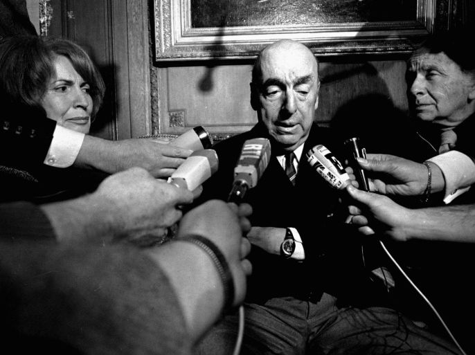 FILE - This Oct. 21, 1971 file photo shows Pablo Neruda, poet and then Chilean ambassador to France, talking with reporters in Paris after being named the 1971 Nobel Prize for Literature. Forensic experts say no traces of chemical agents have been found in Neruda's bone remains. Chile's Communist Party asked to exhume his remains following allegations he may have been poisoned. Officially, Neruda died of cancer only days after the 1973 coup toppled his close friend, President Salvador Allende. His body was exhumed in April 2013. (AP Photo/Laurent Rebours, File)