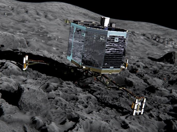 This artist impression from Dec. 2013 by ESA /ATG medialab , publicly provided by the European Space Agency, ESA, shows Rosetta’s lander Philae (front view) on the surface of comet 67P/Churyumov-Gerasimenko. The comet lander Philae has awakened from a seven-month hibernation and managed to communicate with Earth for more than a minute, the European Space Agency said Sunday June 14, 2015. The probe became the first spacecraft to land on a comet when it touched down on the icy surface of 67P/Churyumov-Gerasimenko in November. Shortly after its historic landing, Philae managed to conduct experiments and send data to Earth for about 60 hours before its batteries were depleted and it was forced into hibernation. (ESA/ATG medialab/ESA via AP)