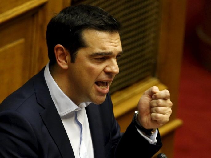 Greek Prime Minister Alexis Tsipras delivers a speech during a parliamentary session in Athens, Greece June 28, 2015. Greek Prime Minister Alexis Tsipras called a referendum on austerity demands from foreign creditors on Saturday, rejecting an "ultimatum" from lenders and putting a deal that could determine Greece's future in Europe to a risky popular vote. REUTERS/Yannis Behrakis TPX IMAGES OF THE DAY