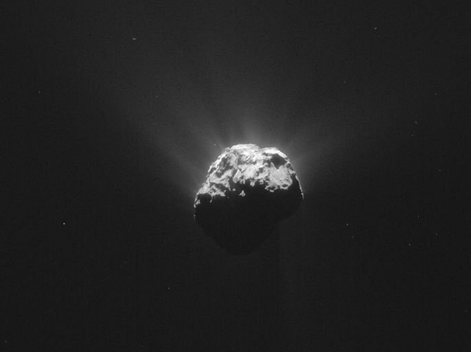 The Comet 67P/Churyumov-Gerasimenko is seen in an image taken by the Rosetta space probe on June 13, 2015 and distributed by the European Space Agency (ESA) on June 17, 2015. The image was taken at a distance of 201 km (126 miles) from the comet, which measures 17.5 km (11 miles) across in the view shown. A robotic space lander has surprised scientists by waking up and sending a signal to Earth, seven months after straying into the shadows of a comet where they feared it might be marooned for ever. The European Space Agency said on Sunday that it had received signals from the lander, named Philae, late on June 13, when it began "speaking" with its team on the ground for the first time since it went into emergency hibernation following a botched landing on the comet in November. REUTERS/ESA - European Space Agency/Handout via Reuters NO SALES. NO ARCHIVES. FOR EDITORIAL USE ONLY. NOT FOR SALE FOR MARKETING OR ADVERTISING CAMPAIGNS. THIS IMAGE HAS BEEN SUPPLIED BY A THIRD PARTY. IT IS DISTRIBUTED, EXACTLY AS RECEIVED BY REUTERS, AS A SERVICE TO CLIENTS.T